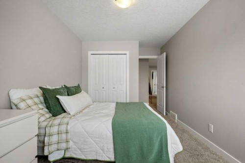 183 Kinniburgh Road, Chestermere, AB - Indoor Photo Showing Bedroom