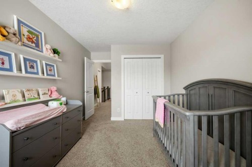 183 Kinniburgh Road, Chestermere, AB - Indoor Photo Showing Bedroom