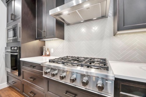 302-105 Lebel Crescent Nw, Calgary, AB - Indoor Photo Showing Kitchen With Upgraded Kitchen