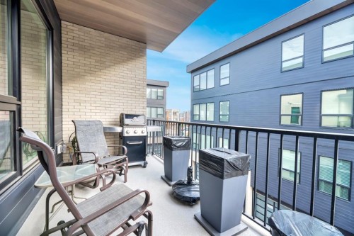 302-105 Lebel Crescent Nw, Calgary, AB - Outdoor With Deck Patio Veranda With Exterior