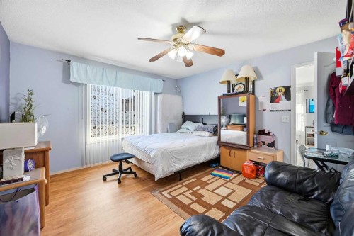 311 Saddlecreek Point Ne, Calgary, AB - Indoor Photo Showing Bedroom