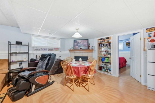 311 Saddlecreek Point Ne, Calgary, AB - Indoor With Fireplace