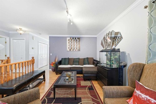 311 Saddlecreek Point Ne, Calgary, AB - Indoor Photo Showing Living Room