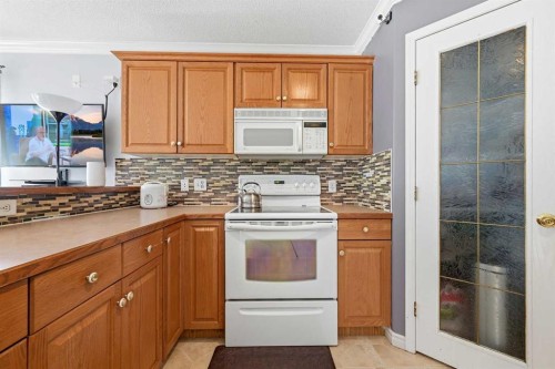 311 Saddlecreek Point Ne, Calgary, AB - Indoor Photo Showing Kitchen
