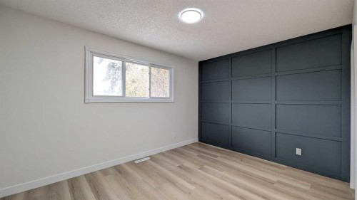 4 Harvey Place Sw, Calgary, AB - Indoor Photo Showing Other Room