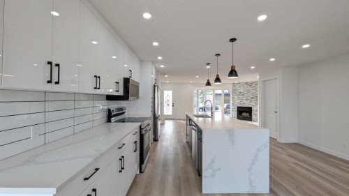 4 Harvey Place Sw, Calgary, AB - Indoor Photo Showing Kitchen With Upgraded Kitchen