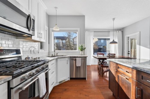 29 Cougarstone Manor Sw, Calgary, AB - Indoor Photo Showing Kitchen With Upgraded Kitchen