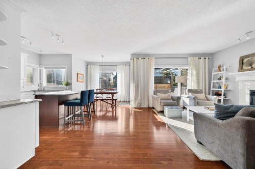 29 Cougarstone Manor Sw, Calgary, AB - Indoor Photo Showing Living Room With Fireplace
