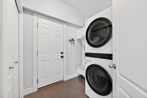 29 Cougarstone Manor Sw, Calgary, AB - Indoor Photo Showing Laundry Room