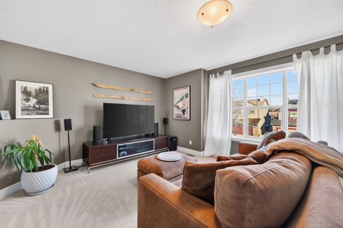 29 Cougarstone Manor Sw, Calgary, AB - Indoor Photo Showing Living Room