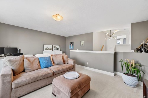 29 Cougarstone Manor Sw, Calgary, AB - Indoor Photo Showing Living Room