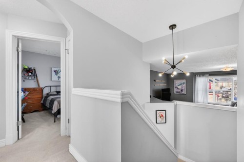 29 Cougarstone Manor Sw, Calgary, AB - Indoor Photo Showing Other Room