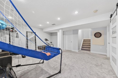 29 Cougarstone Manor Sw, Calgary, AB - Indoor Photo Showing Other Room