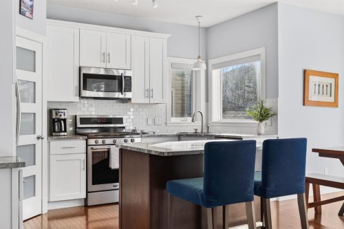 29 Cougarstone Manor Sw, Calgary, AB - Indoor Photo Showing Kitchen With Upgraded Kitchen