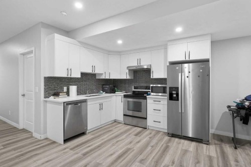 953 West Lakeview Drive, Chestermere, AB - Indoor Photo Showing Kitchen With Stainless Steel Kitchen