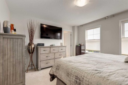 165 Sundown Road, Cochrane, AB - Indoor Photo Showing Bedroom