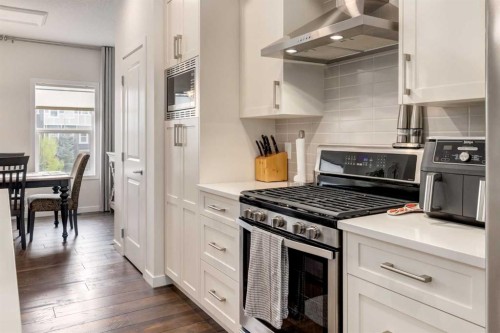 165 Sundown Road, Cochrane, AB - Indoor Photo Showing Kitchen
