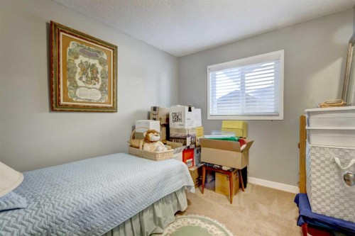 156 Cedarbrook Way Sw, Calgary, AB - Indoor Photo Showing Bedroom