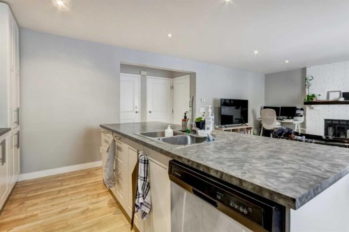 156 Cedarbrook Way Sw, Calgary, AB - Indoor Photo Showing Kitchen With Double Sink