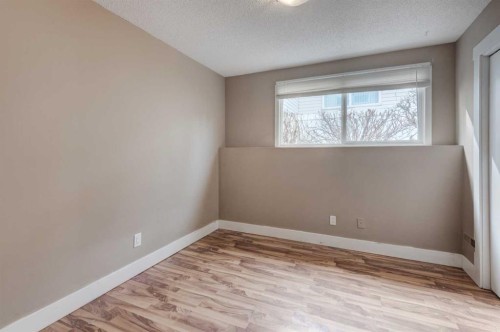 11452 8 Street Sw, Calgary, AB - Indoor Photo Showing Other Room