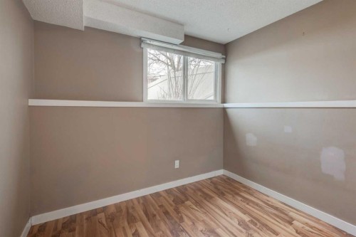 11452 8 Street Sw, Calgary, AB - Indoor Photo Showing Other Room
