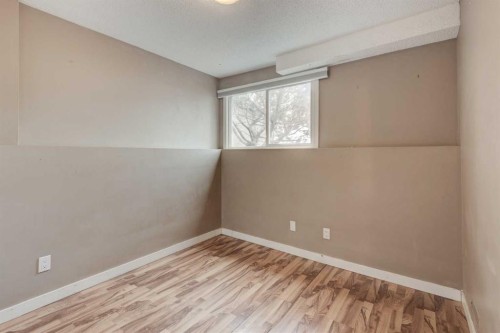 11452 8 Street Sw, Calgary, AB - Indoor Photo Showing Other Room