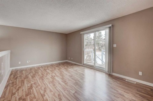 11452 8 Street Sw, Calgary, AB - Indoor Photo Showing Other Room