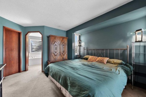 52 Riverwood Circle Se, Calgary, AB - Indoor Photo Showing Bedroom