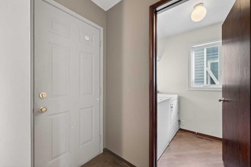 52 Riverwood Circle Se, Calgary, AB - Indoor Photo Showing Laundry Room