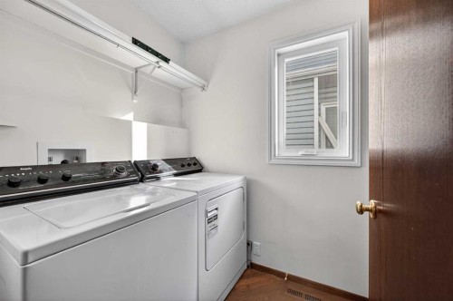 52 Riverwood Circle Se, Calgary, AB - Indoor Photo Showing Laundry Room