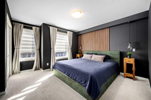 403-474 Seton Circle Se, Calgary, AB - Indoor Photo Showing Bedroom
