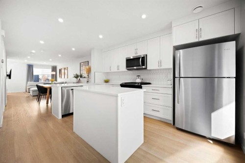 403-474 Seton Circle Se, Calgary, AB - Indoor Photo Showing Kitchen With Upgraded Kitchen