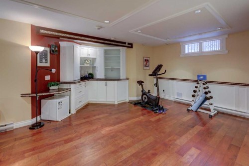 66 Scimitar Point Nw, Calgary, AB - Indoor Photo Showing Gym Room
