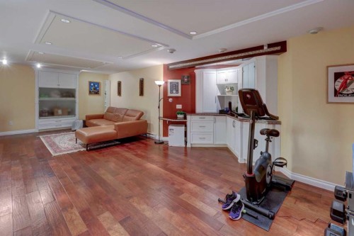 66 Scimitar Point Nw, Calgary, AB - Indoor Photo Showing Gym Room