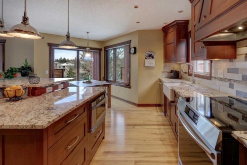 66 Scimitar Point Nw, Calgary, AB - Indoor Photo Showing Kitchen With Upgraded Kitchen
