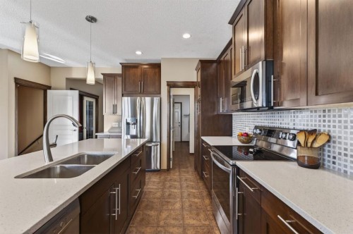 3 Pantego Avenue Nw, Calgary, AB - Indoor Photo Showing Kitchen With Stainless Steel Kitchen With Double Sink With Upgraded Kitchen