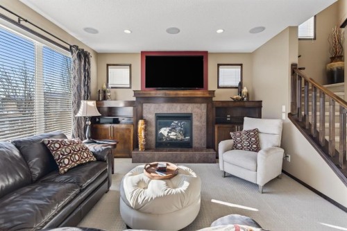 3 Pantego Avenue Nw, Calgary, AB - Indoor Photo Showing Living Room With Fireplace