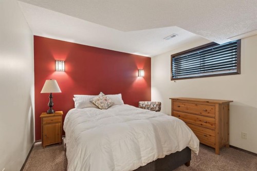 3 Pantego Avenue Nw, Calgary, AB - Indoor Photo Showing Bedroom