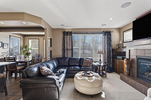 3 Pantego Avenue Nw, Calgary, AB - Indoor Photo Showing Living Room With Fireplace