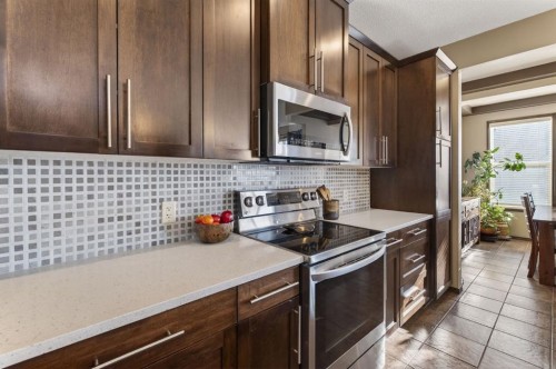 3 Pantego Avenue Nw, Calgary, AB - Indoor Photo Showing Kitchen With Upgraded Kitchen