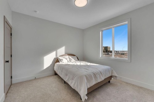 2044 Waterbury Road, Chestermere, AB - Indoor Photo Showing Bedroom