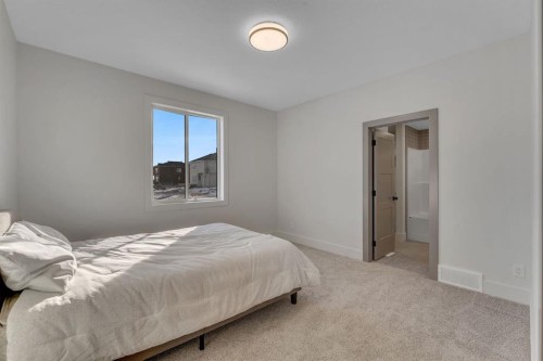 2044 Waterbury Road, Chestermere, AB - Indoor Photo Showing Bedroom