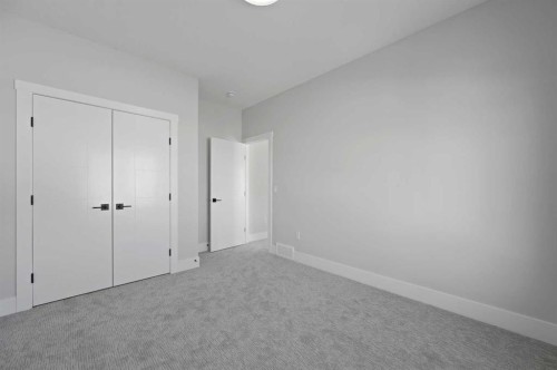 68 Heritage Ridge, Cochrane, AB - Indoor Photo Showing Other Room
