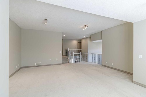 67 Evergreen Row Sw, Calgary, AB - Indoor Photo Showing Other Room