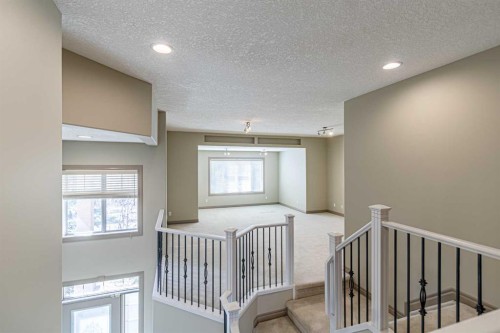 67 Evergreen Row Sw, Calgary, AB - Indoor Photo Showing Other Room