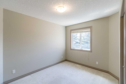 67 Evergreen Row Sw, Calgary, AB - Indoor Photo Showing Other Room