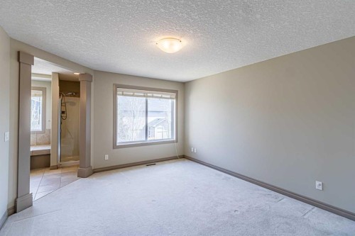 67 Evergreen Row Sw, Calgary, AB - Indoor Photo Showing Other Room