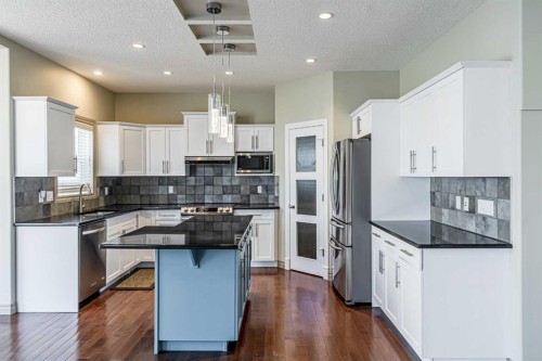 67 Evergreen Row Sw, Calgary, AB - Indoor Photo Showing Kitchen With Upgraded Kitchen