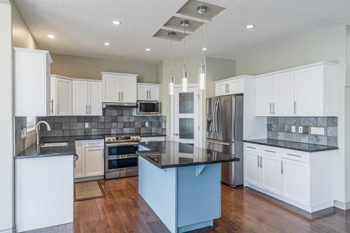 67 Evergreen Row Sw, Calgary, AB - Indoor Photo Showing Kitchen With Upgraded Kitchen