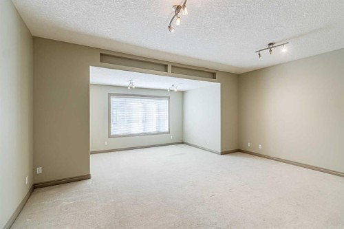 67 Evergreen Row Sw, Calgary, AB - Indoor Photo Showing Other Room